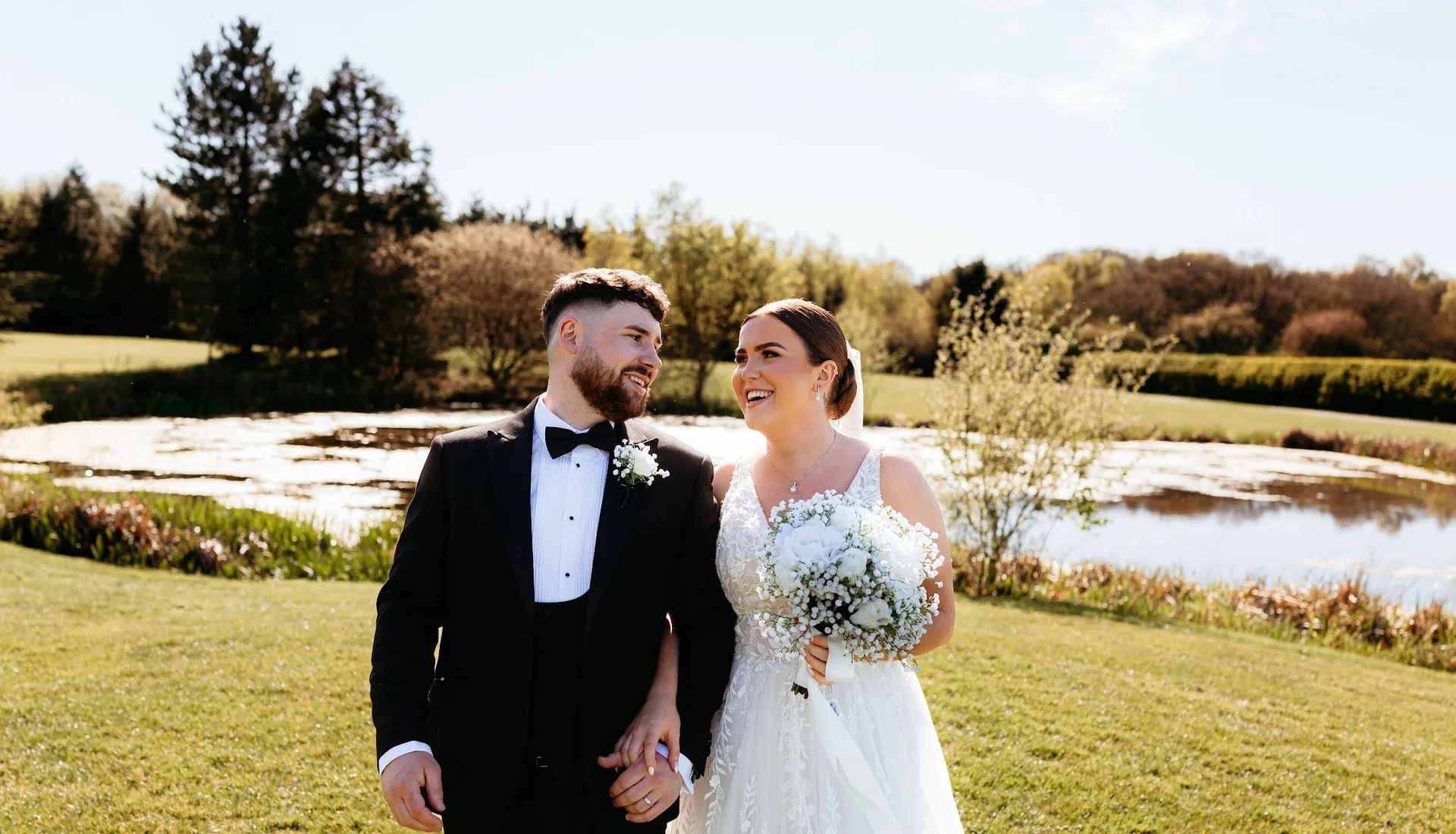 A couple in the grounds at The Hidden Oak.