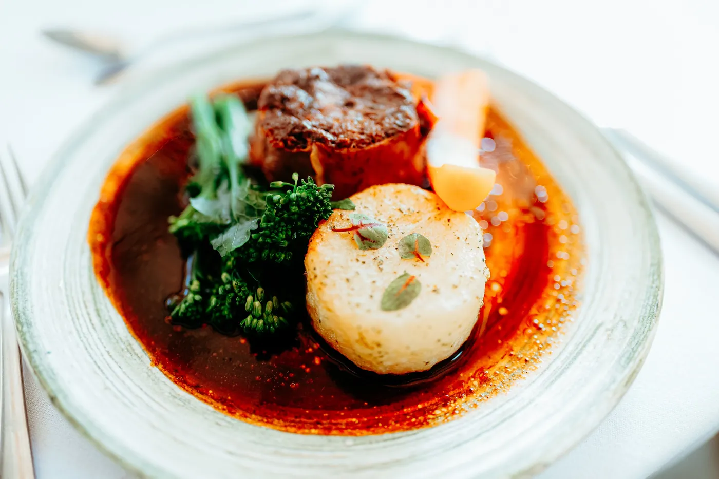 Beef with broccolini in a rich sauce