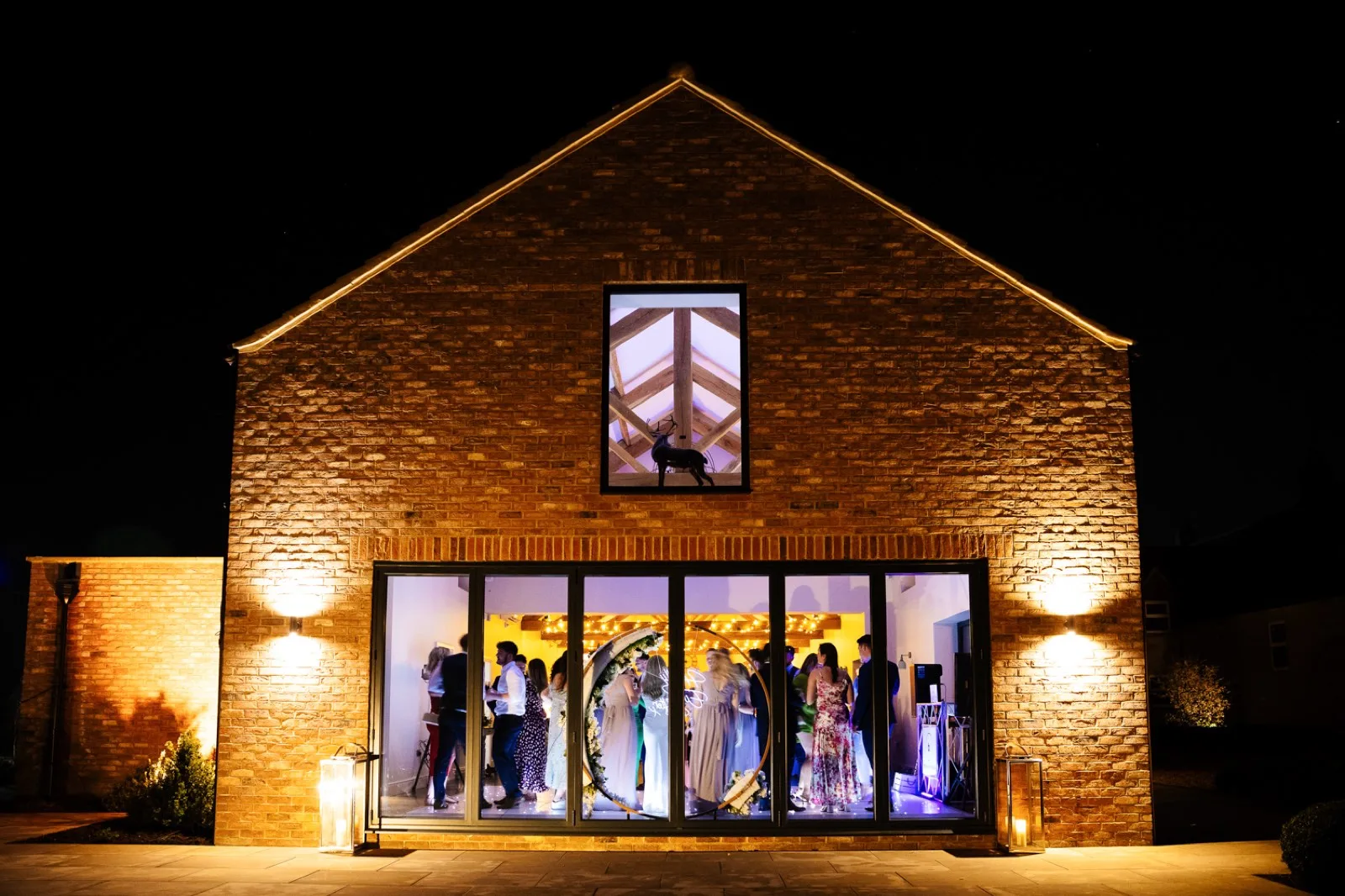 The Barn lit up as night falls