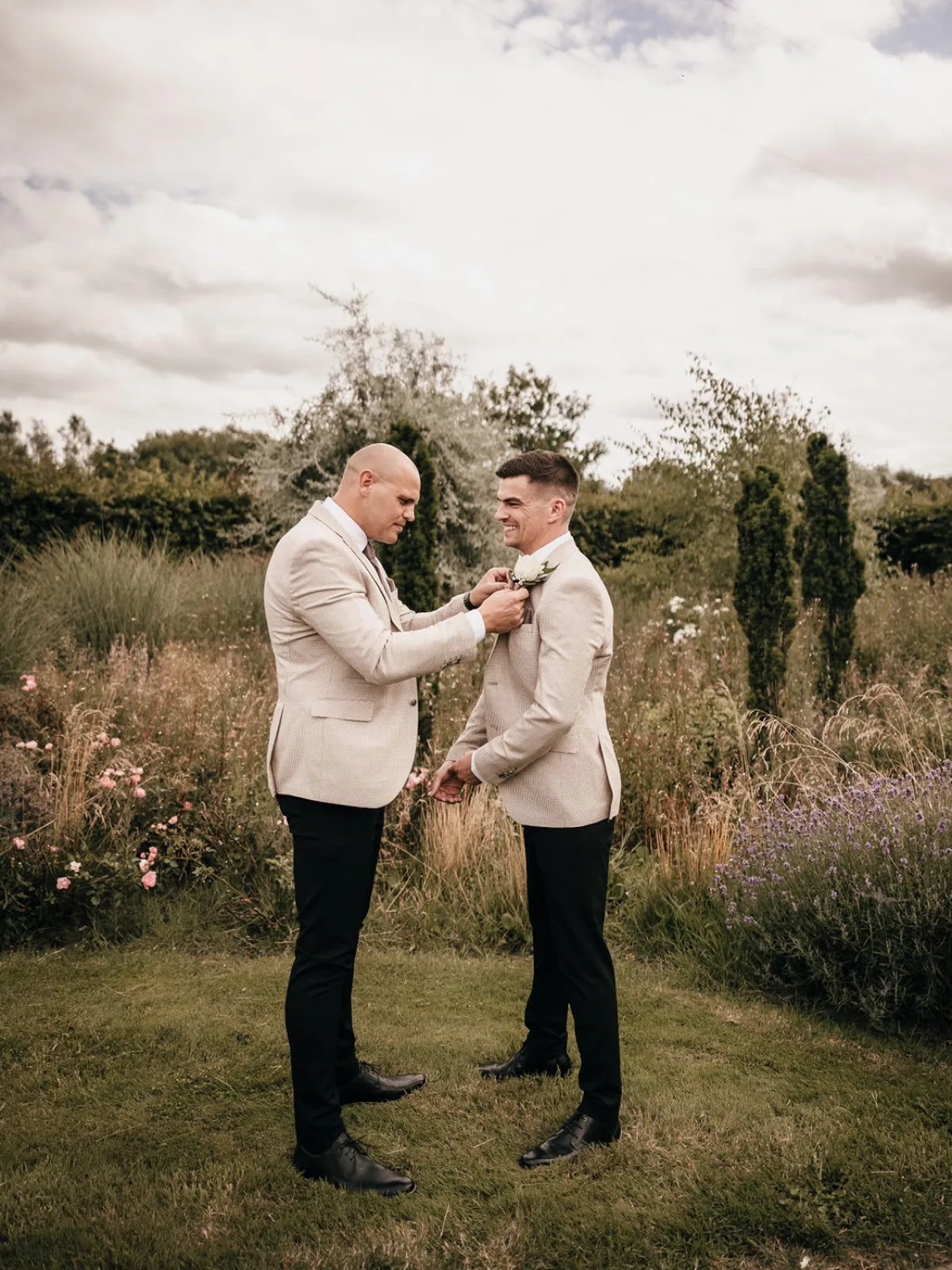 Two grooms in the gardens
